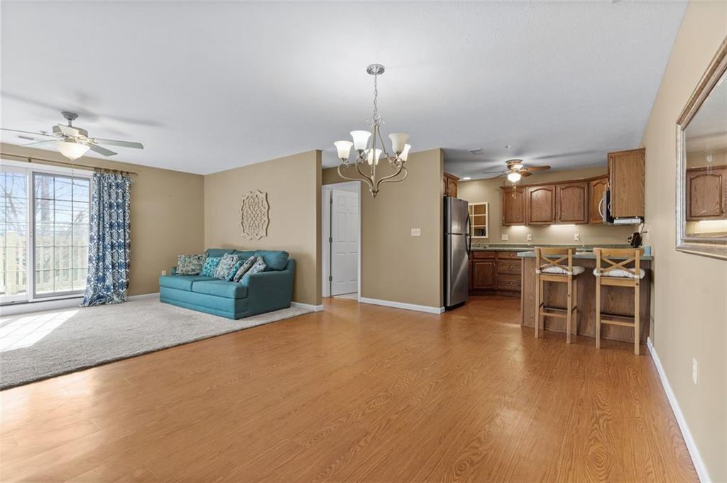 1 Coraopolis Road Coraopolis, PA 15108 - Photo 4 of 24 a large room with chandelier fan and windows