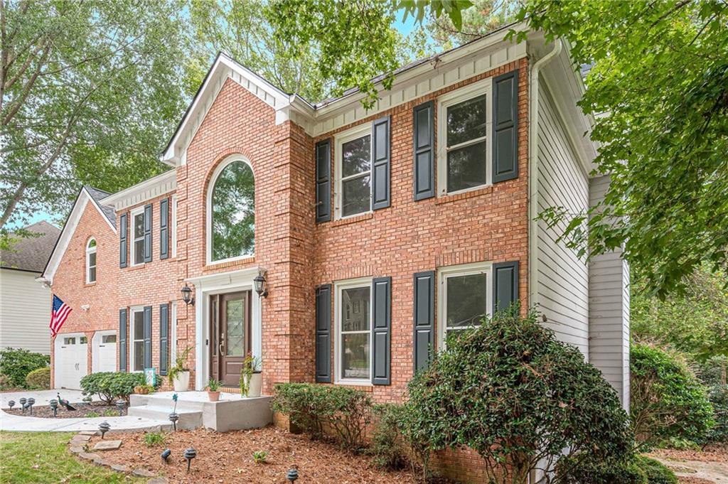 461 Braidwood Walk Northwest Acworth, GA 30101 - Photo 17 of 67 a front view of a house with a yard