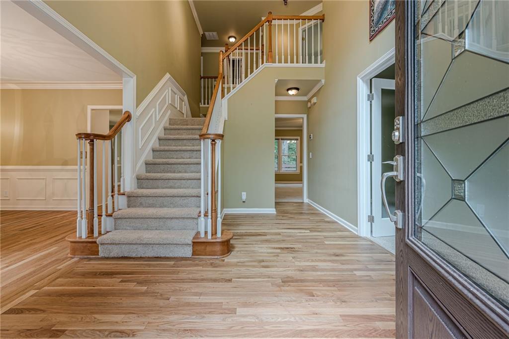 461 Braidwood Walk Northwest Acworth, GA 30101 - Photo 19 of 67 a view of entryway and hall with wooden floor