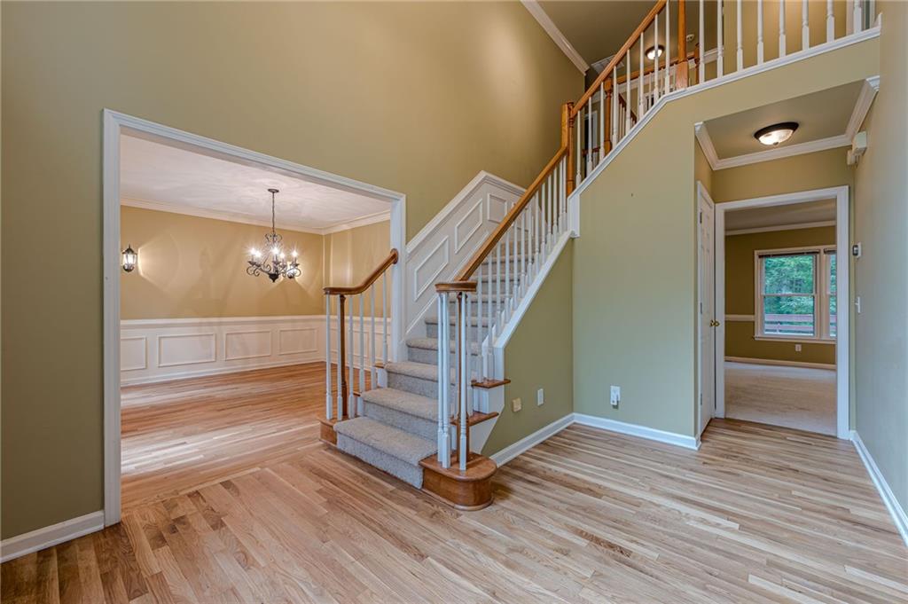 461 Braidwood Walk Northwest Acworth, GA 30101 - Photo 20 of 67 a view of entryway and hall with wooden floor