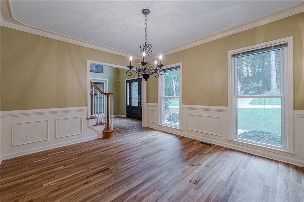 461 Braidwood Walk Northwest Acworth, GA 30101 - Photo 2 of 67 a view of a room with wooden floor and window