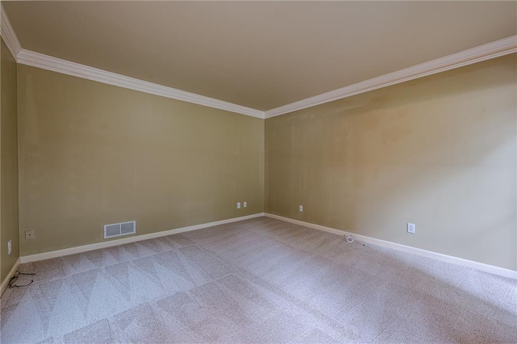 461 Braidwood Walk Northwest Acworth, GA 30101 - Photo 22 of 67 a view of an empty room with a window