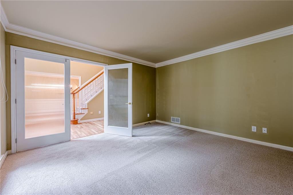 461 Braidwood Walk Northwest Acworth, GA 30101 - Photo 23 of 67 a view of an empty room with a window