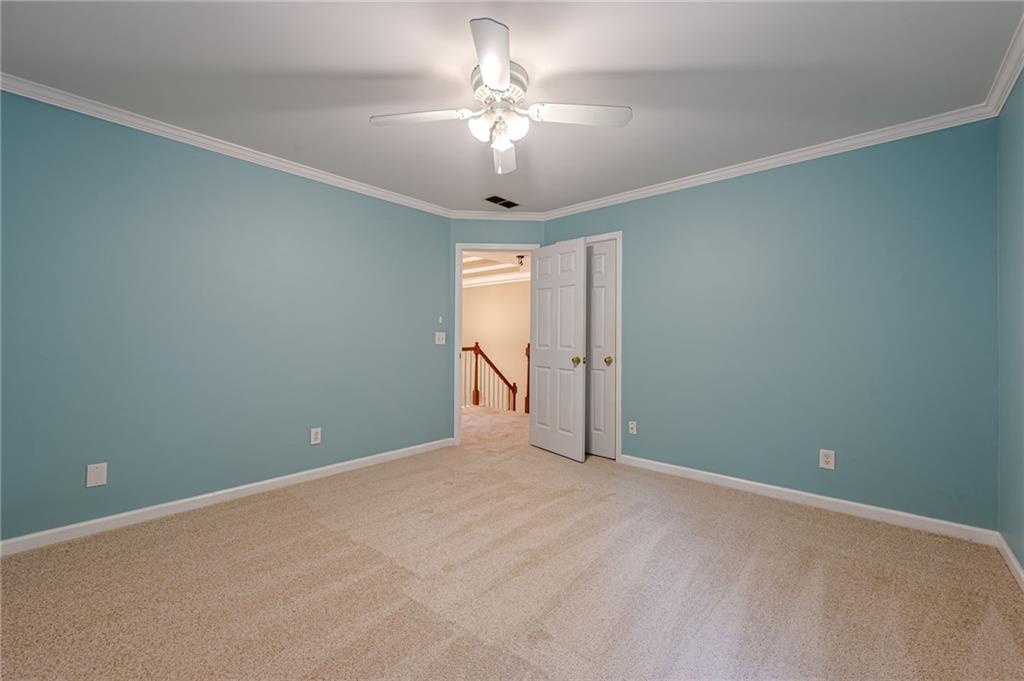461 Braidwood Walk Northwest Acworth, GA 30101 - Photo 39 of 67 a view of an empty room with a window