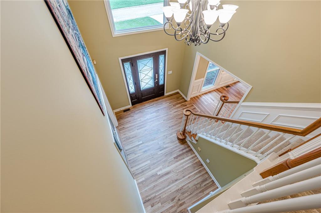 461 Braidwood Walk Northwest Acworth, GA 30101 - Photo 44 of 67 a view of a livingroom with wooden floor and stairs