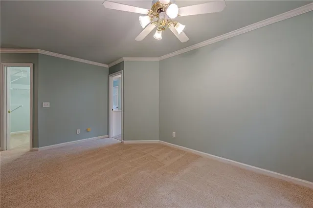 a view of a patio with couches table and chairs and potted plants