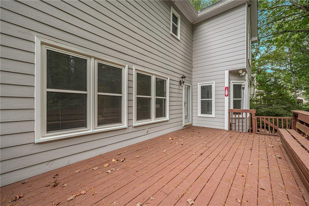 461 Braidwood Walk Northwest Acworth, GA 30101 - Photo 60 of 67 a view of backyard with deck and wooden floor