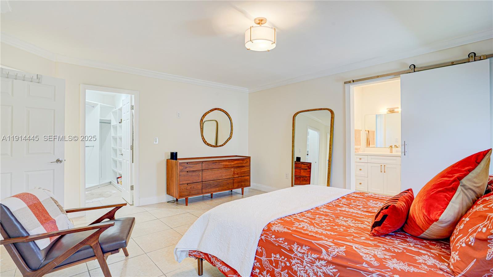 9573 Southwest 57th Street Miami, FL 33173 - Photo 19 of 34 a bedroom with bed and wooden floor