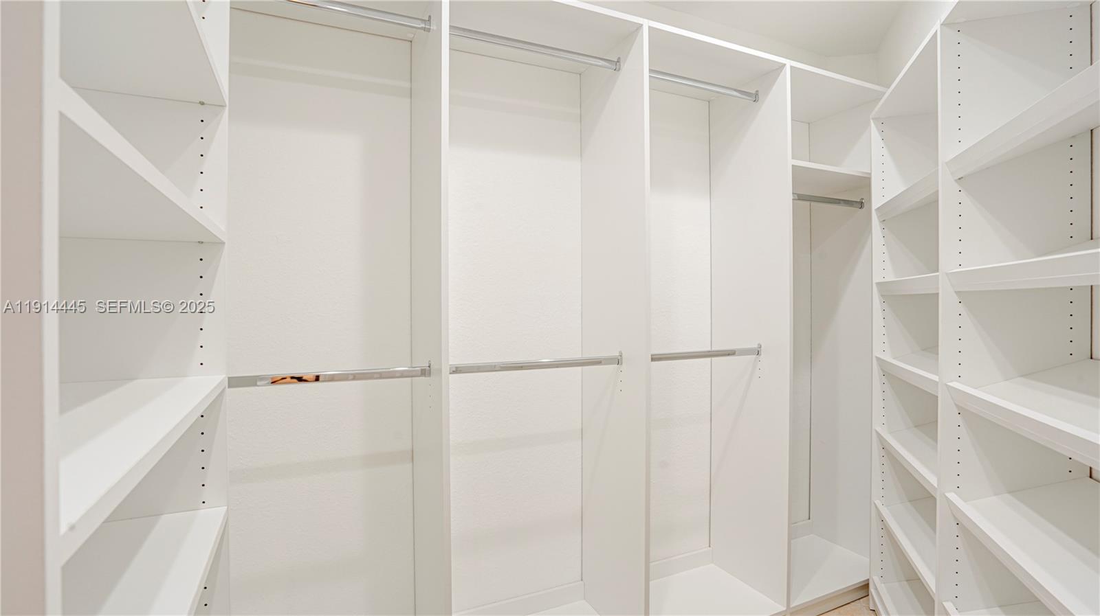 9573 Southwest 57th Street Miami, FL 33173 - Photo 23 of 34 a view of an empty walk in closet