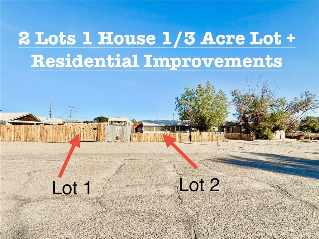 a view of a swimming pool with an outdoor seating