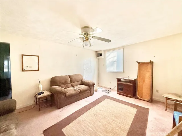 a bedroom with furniture and a couch