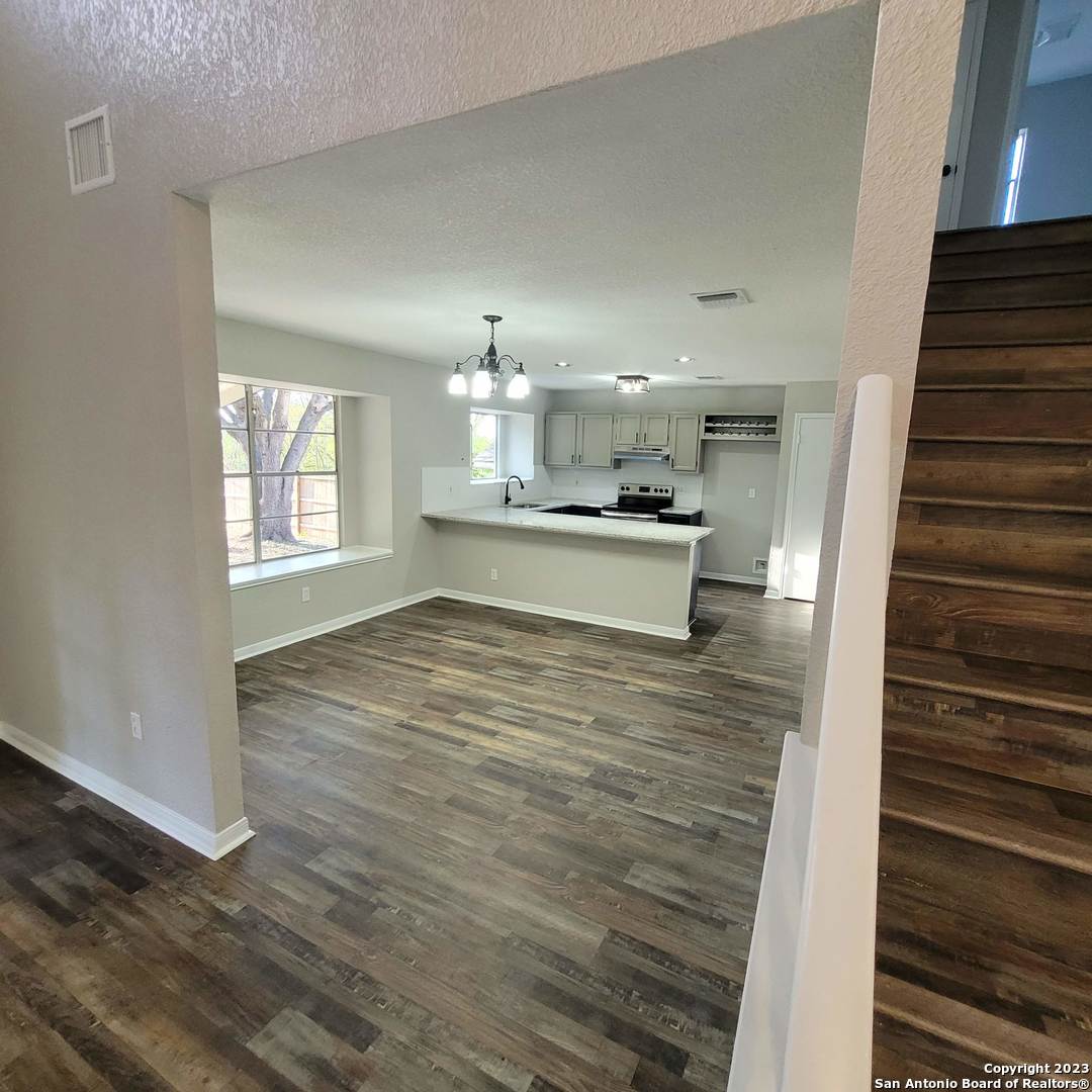 14623 Highland Ridge San Antonio, TX 78233 - Photo 11 of 37 a view of a kitchen and windows
