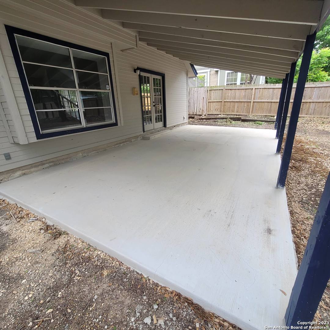 14623 Highland Ridge San Antonio, TX 78233 - Photo 34 of 37 a view of empty room with wooden floor and fan