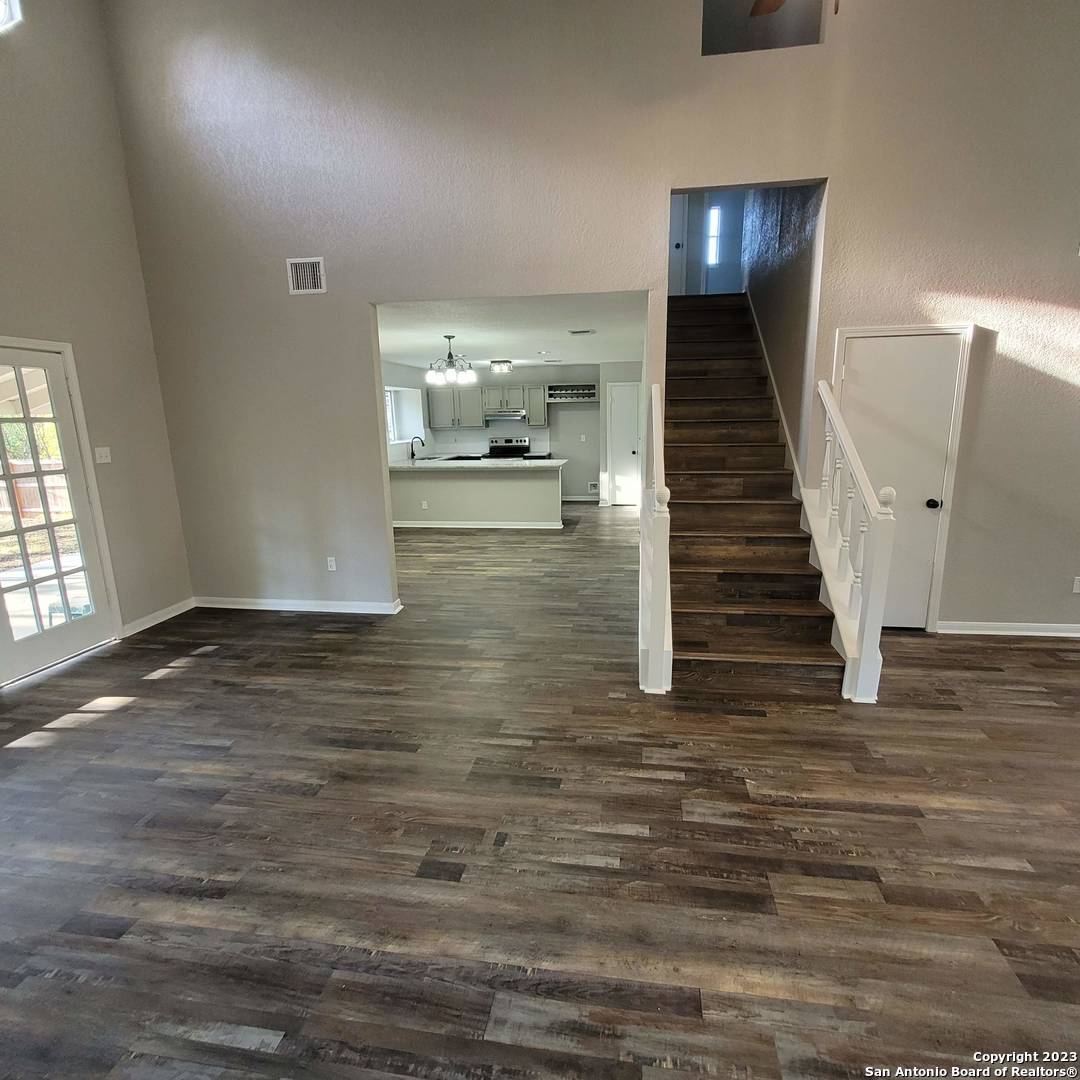 14623 Highland Ridge San Antonio, TX 78233 - Photo 8 of 37 a view of entryway and hall with wooden floor