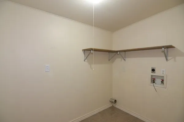 a view of a room with racks on the wall