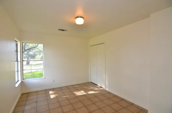 a view of an empty room and window
