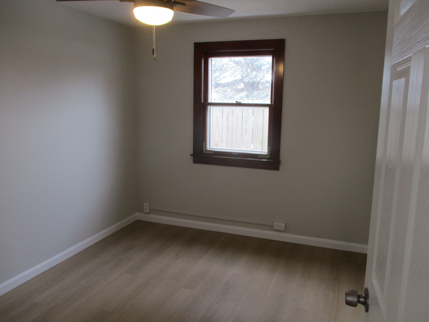 918 West Vine Street Champaign, IL 61821 - Photo 9 of 14 an empty room with a window