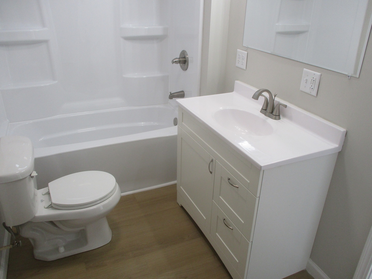 918 West Vine Street Champaign, IL 61821 - Photo 10 of 14 a bathroom with a sink toilet and shower