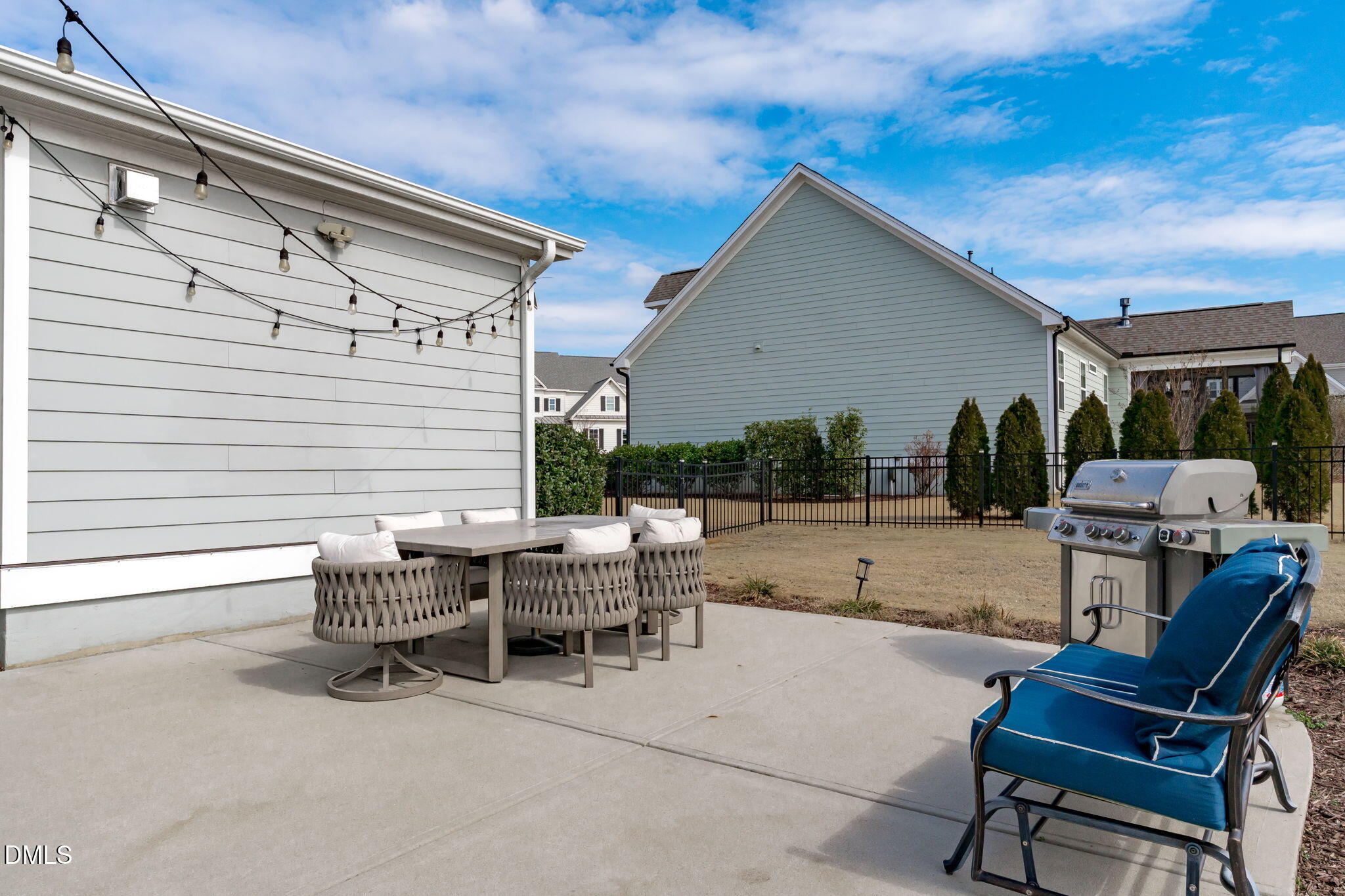 4144 Olde Judd Drive Willow Spring, NC 27592 - Photo 37 of 52 a view of a patio with a chairs and table in a patio