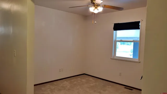 a bathroom with a tub shower sink vanity and a mirror