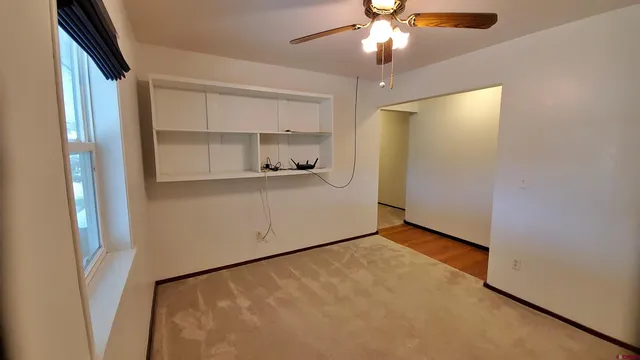 a bathroom with a sink a mirror and a toilet