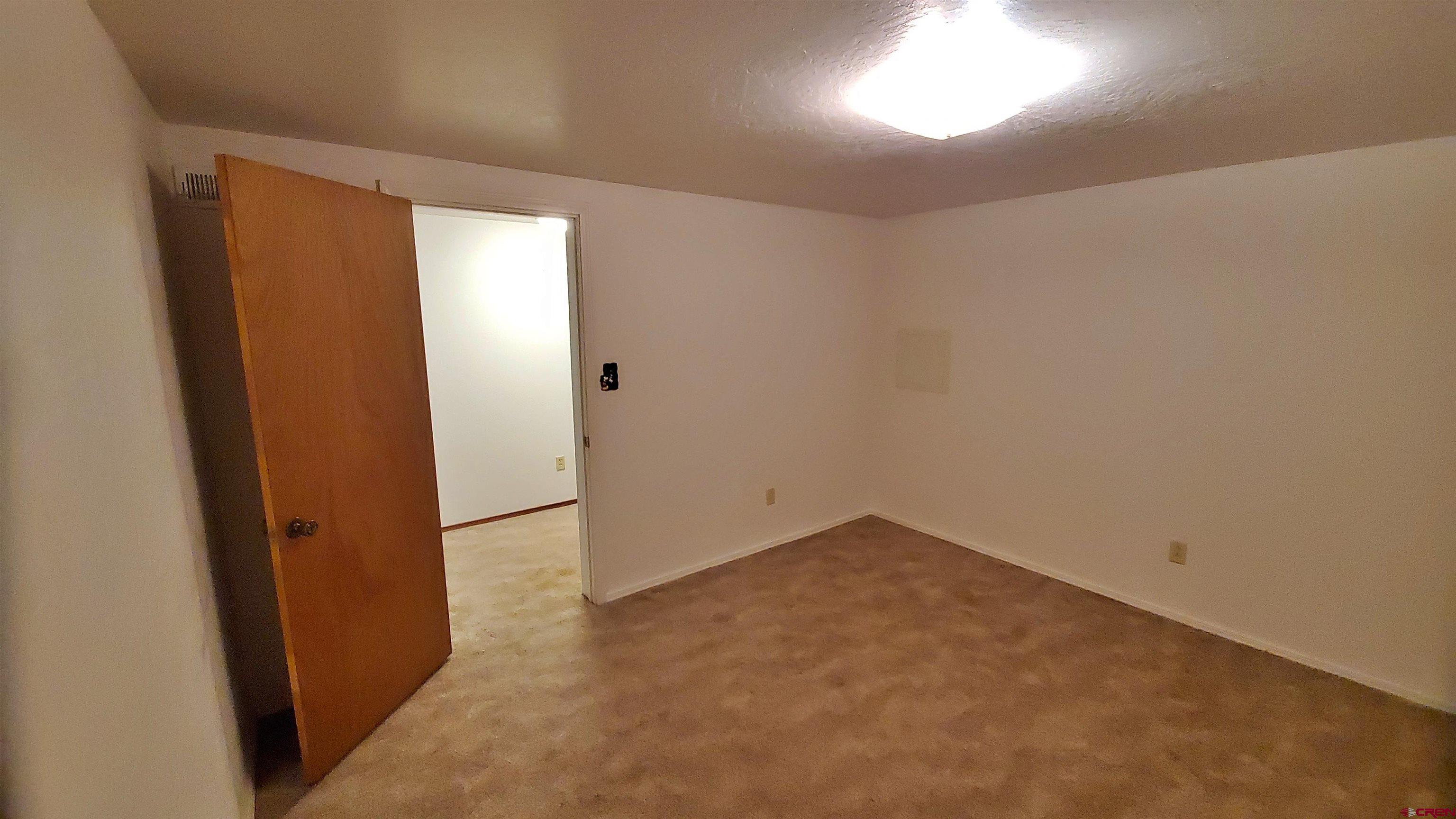 22250 County Rd M Cortez, CO 81321 - Photo 31 of 45 an empty room with windows