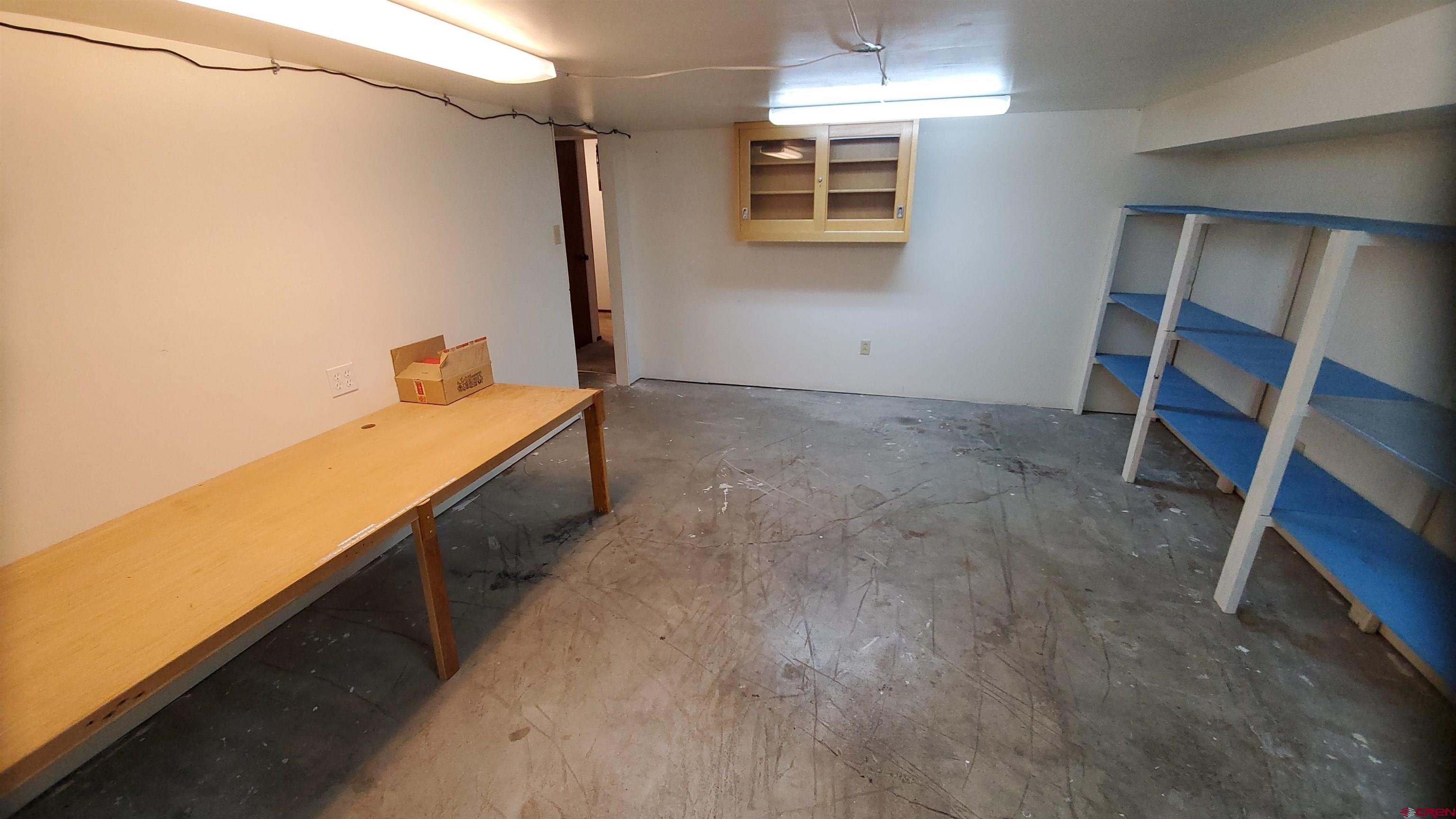 22250 County Rd M Cortez, CO 81321 - Photo 34 of 45 a room with storage and utility