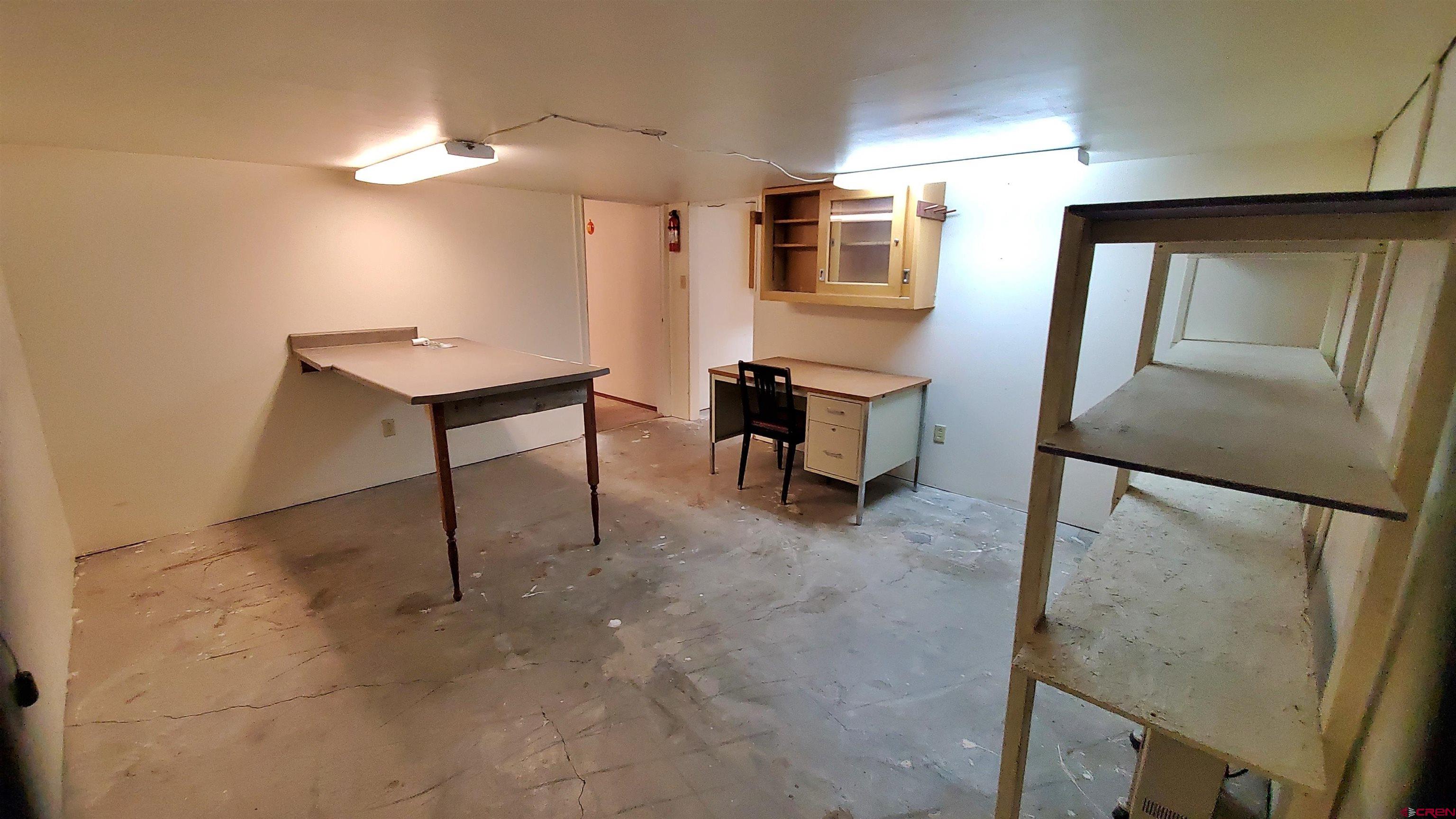 22250 County Rd M Cortez, CO 81321 - Photo 35 of 45 a view of kitchen with sink and a refrigerator