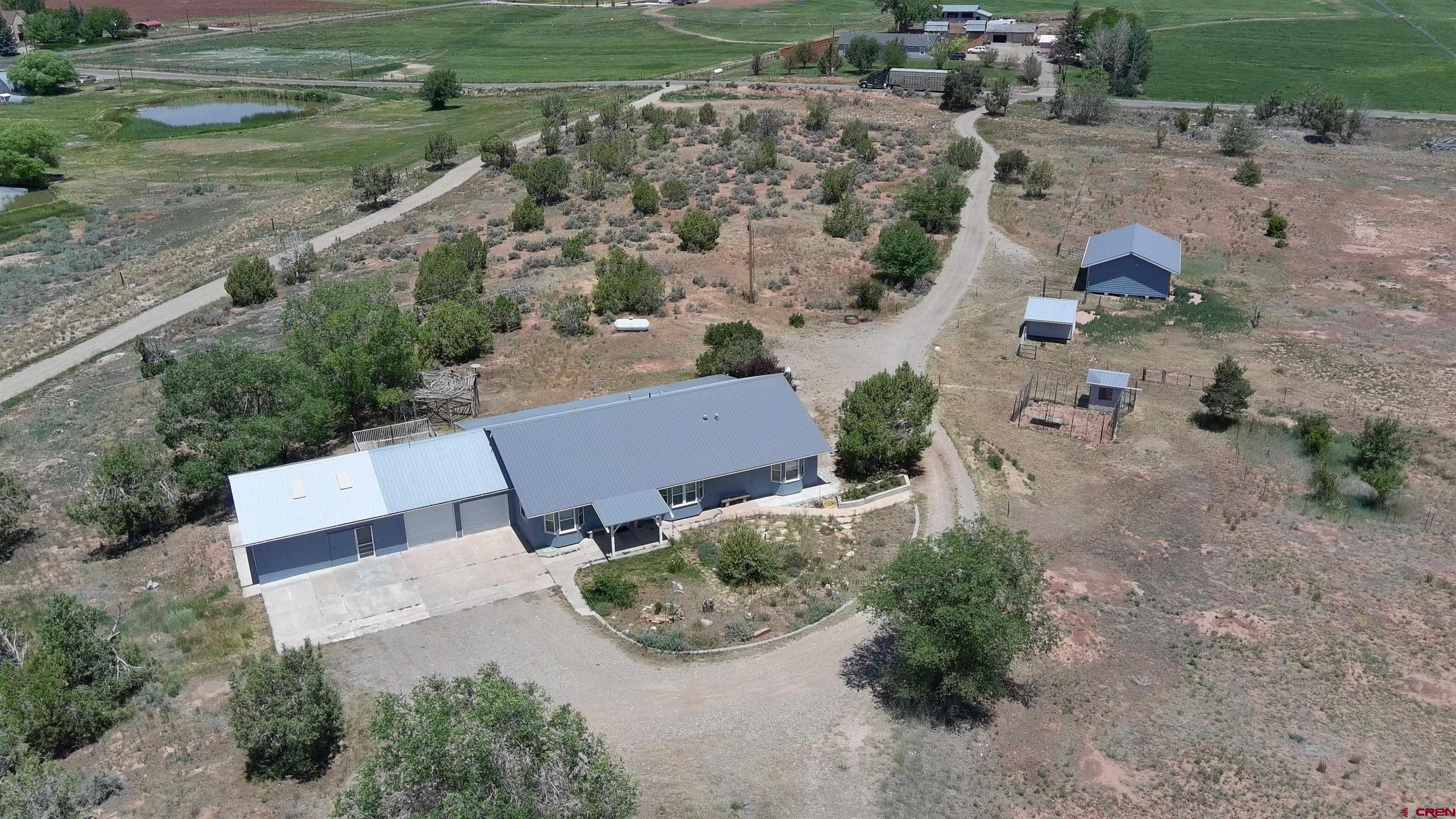 22250 County Rd M Cortez, CO 81321 - Photo 45 of 45 an aerial view of a house with outdoor space