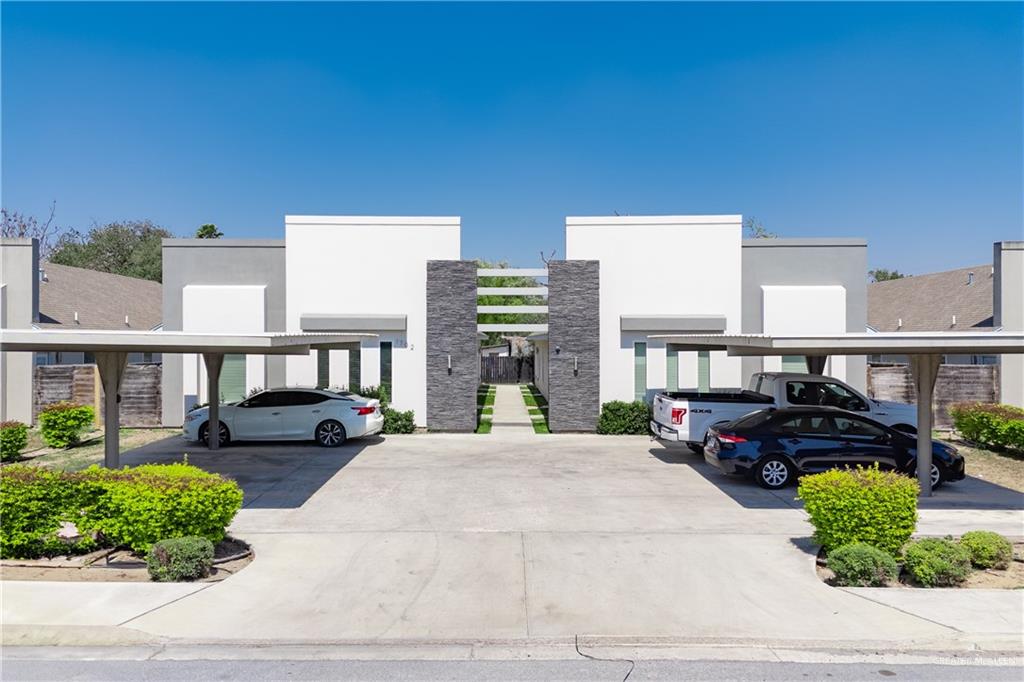 a view of a building and car parked