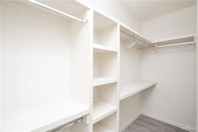 a view of an empty walk in closet