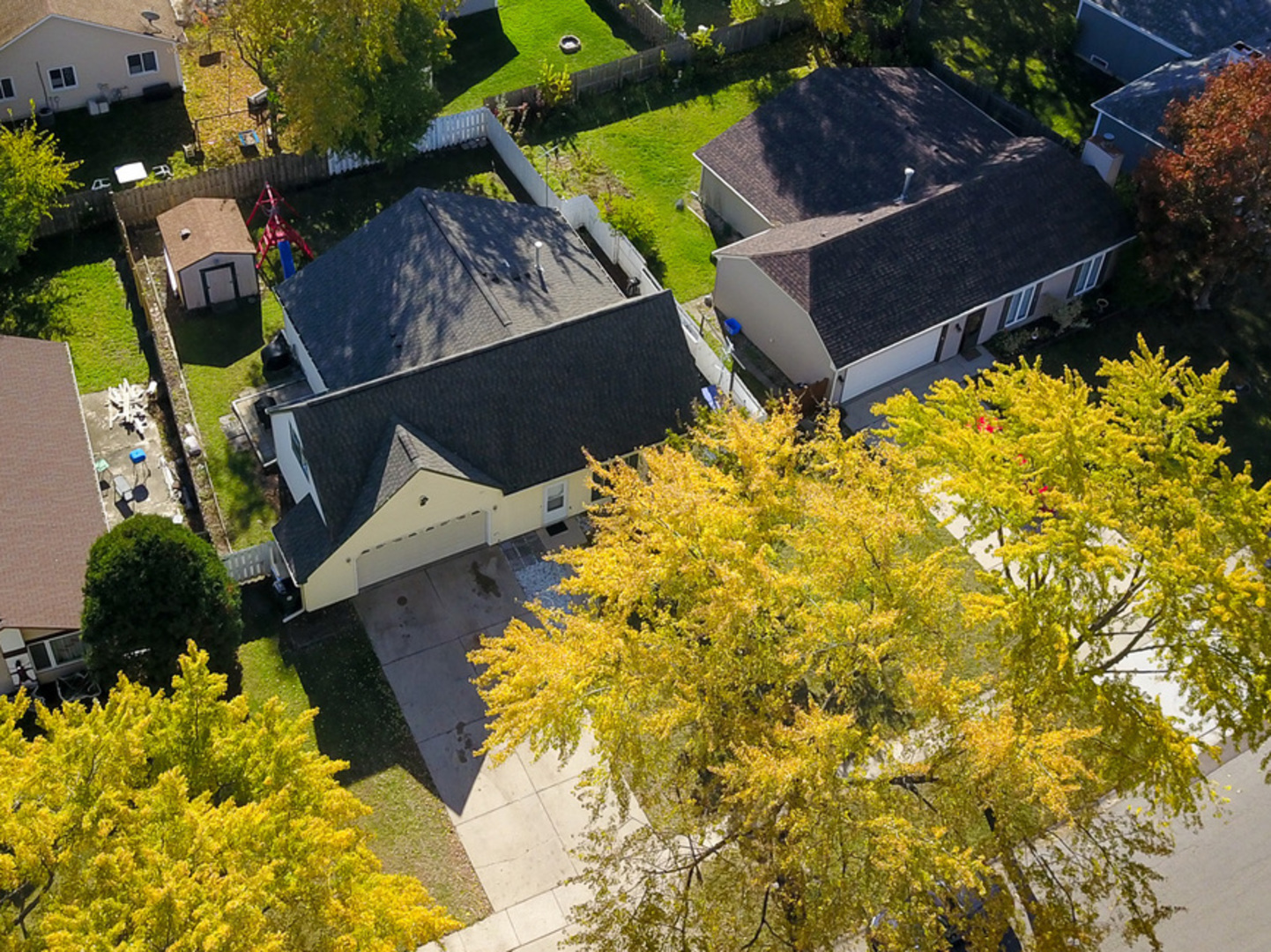 215 Fernwood Road Montgomery, IL 60538 - Photo 22 of 28 an aerial view of a house with swimming pool and outdoor space