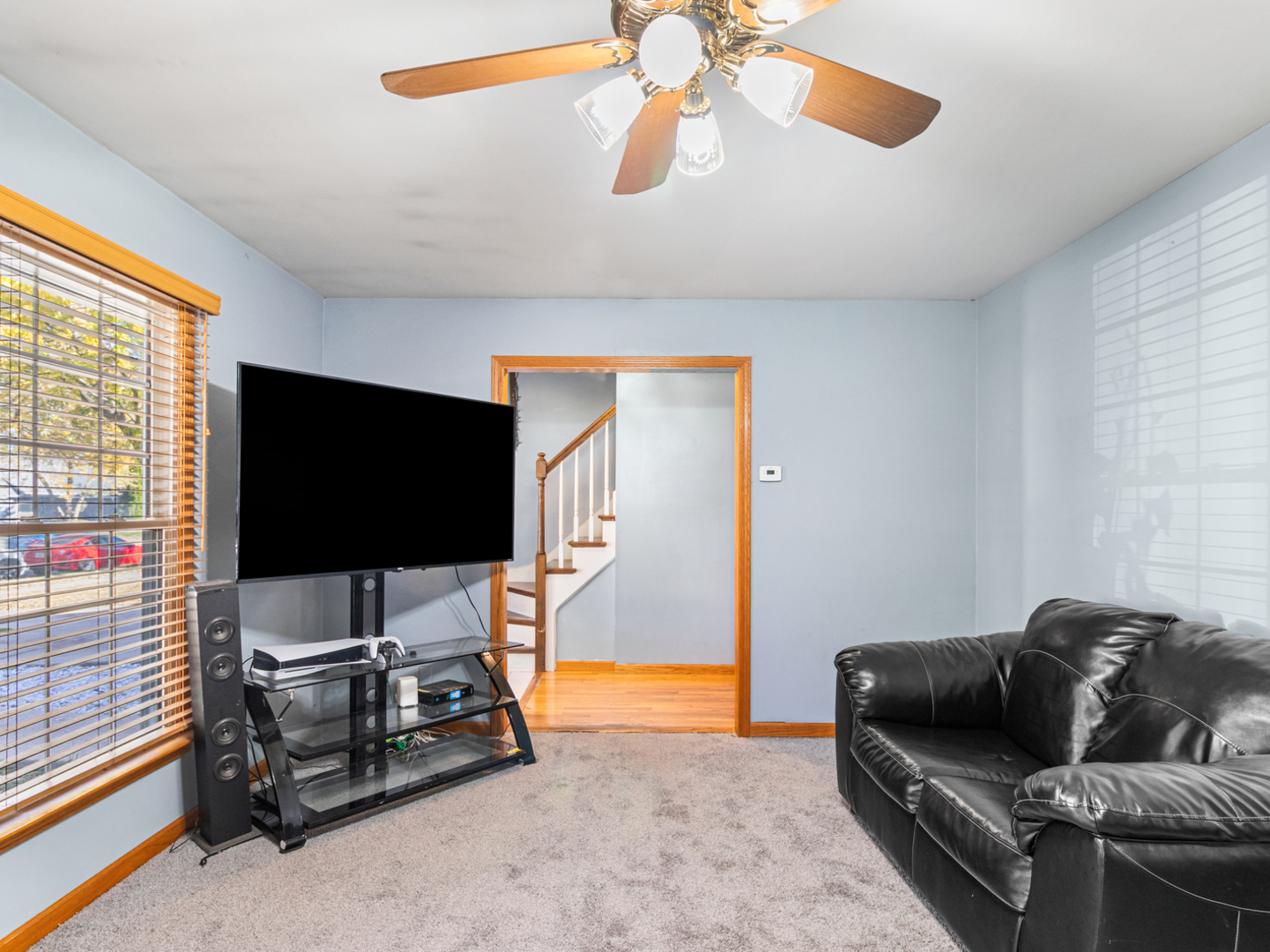 215 Fernwood Road Montgomery, IL 60538 - Photo 7 of 28 a living room with furniture and a flat screen tv