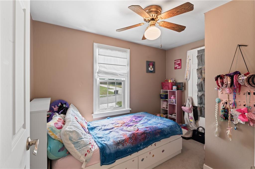 21 Circle Drive Beaver, PA 15009 - Photo 24 of 30 a bedroom with a bed and a chandelier