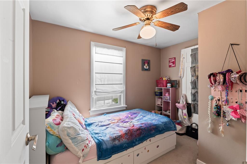 21 Circle Drive Beaver, PA 15009 - Photo 25 of 30 a bedroom with a bed and a chandelier