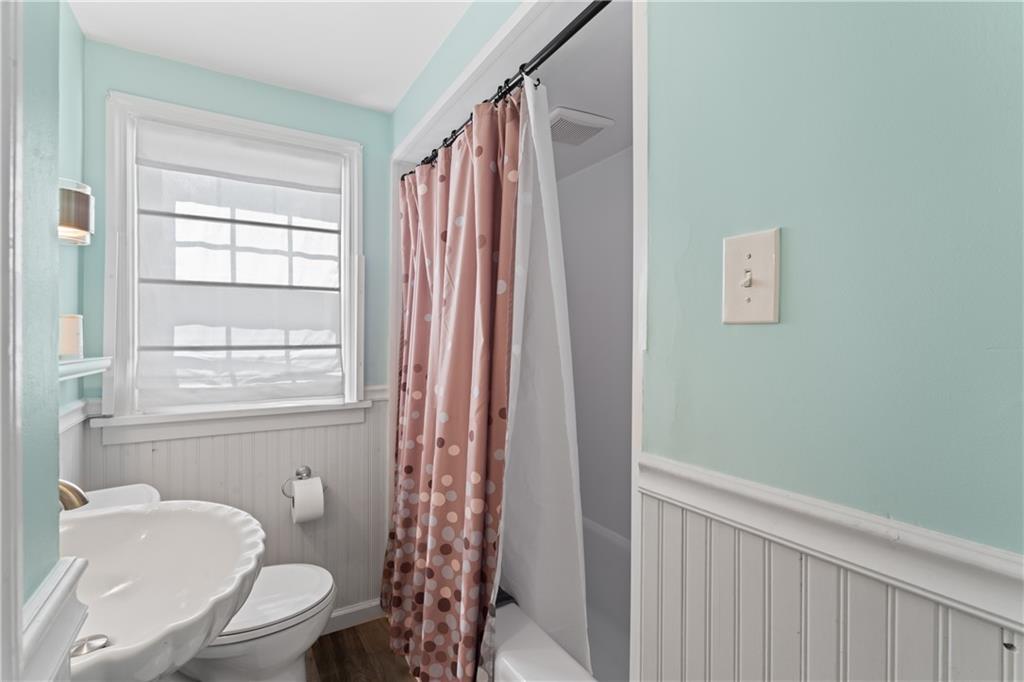 21 Circle Drive Beaver, PA 15009 - Photo 27 of 30 a bathroom with a toilet a sink and a window