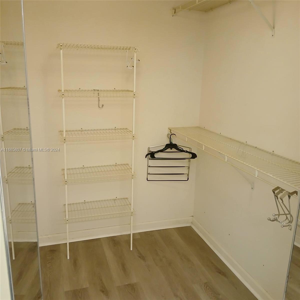 7136 South Devon Drive, Unit 207 Tamarac, FL 33321 - Photo 18 of 24 a view of empty room with empty racks