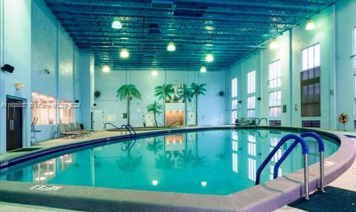 7136 South Devon Drive, Unit 207 Tamarac, FL 33321 - Photo 20 of 24 a view of swimming pool from a balcony