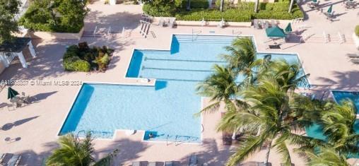 7136 South Devon Drive, Unit 207 Tamarac, FL 33321 - Photo 21 of 24 an aerial view of residential houses with outdoor space