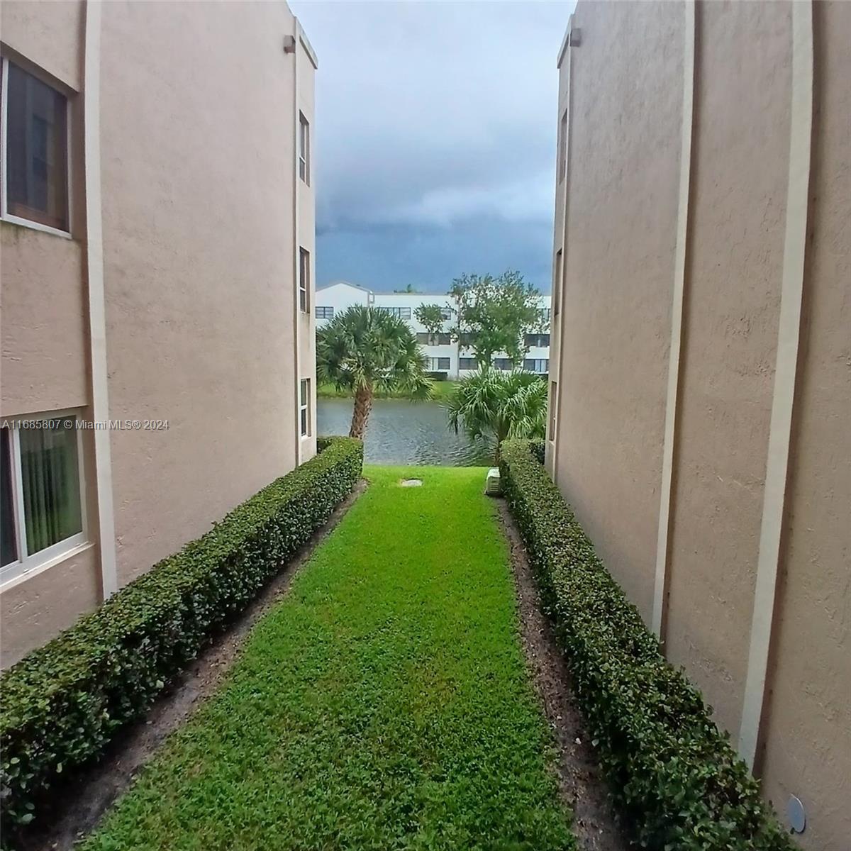 7136 South Devon Drive, Unit 207 Tamarac, FL 33321 - Photo 7 of 24 a view of a backyard of the house