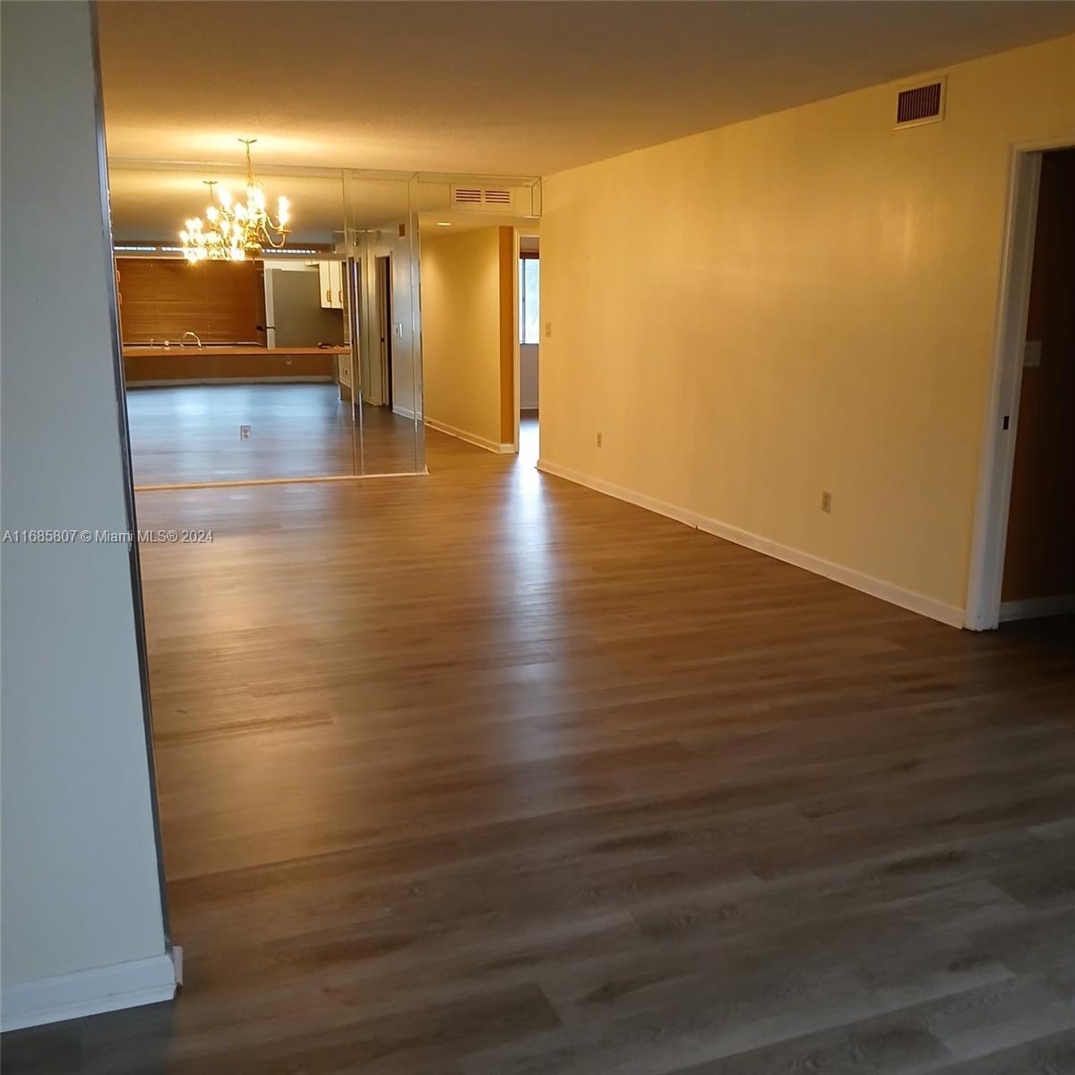 7136 South Devon Drive, Unit 207 Tamarac, FL 33321 - Photo 9 of 24 a view of gallery with wooden floor