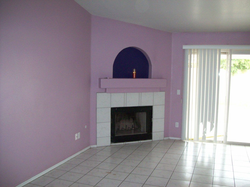 8935 West Monte Vista Road Phoenix, AZ 85037 - Photo 11 of 20 fireplace in family rm