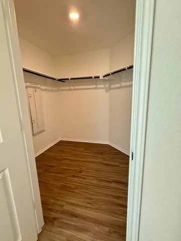 a view of an empty walk in closet