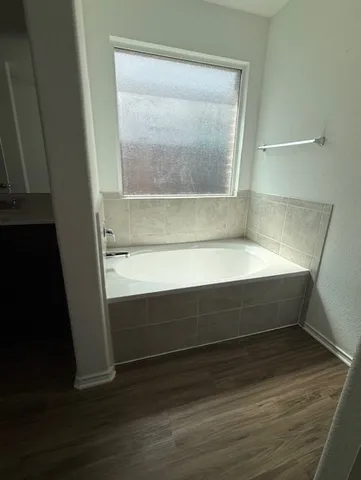 a bathroom with a bathtub