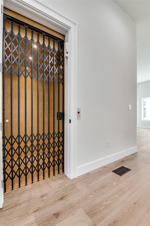 218 East Dallas Road, Unit 102 Grapevine, TX 76051 - Photo 9 of 33 a view of a black gate