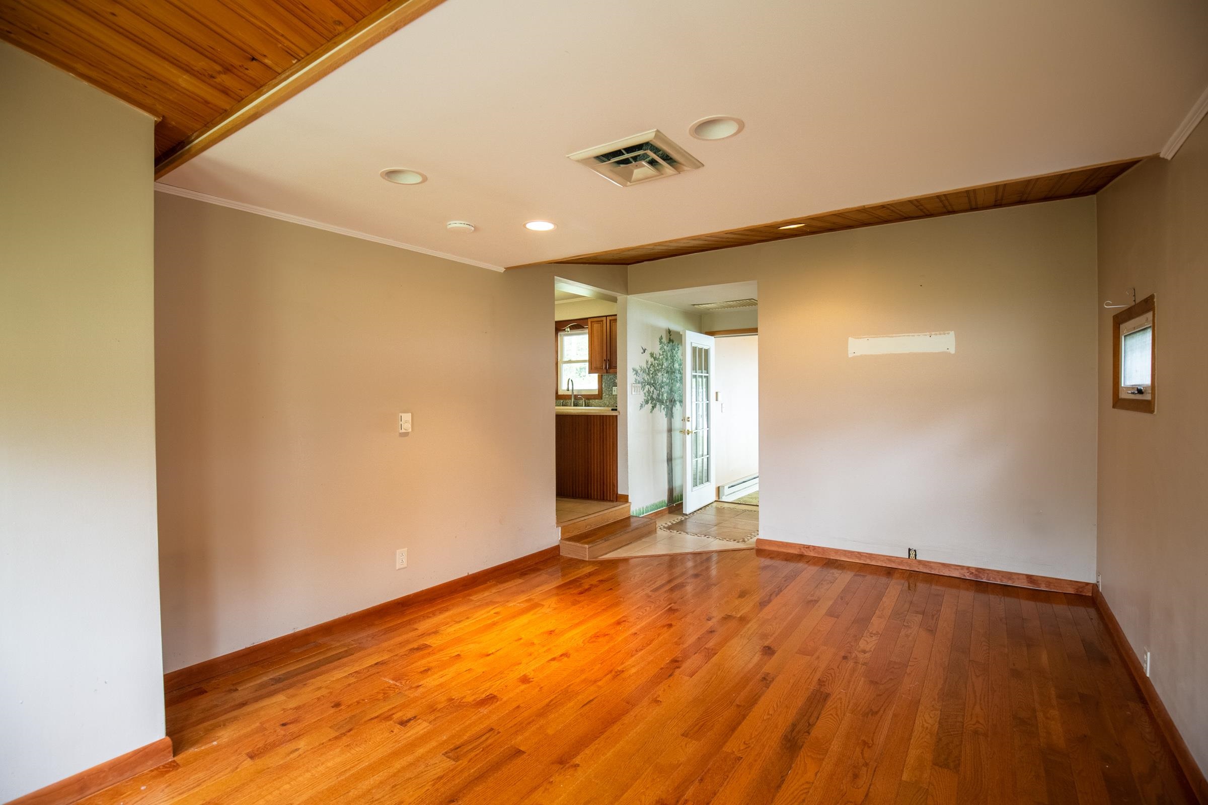 312 Ridge Cape May, NJ 08204 - Photo 14 of 32 a view of an empty room with wooden floor and a window