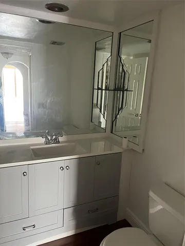 a view of gallery with wooden floor