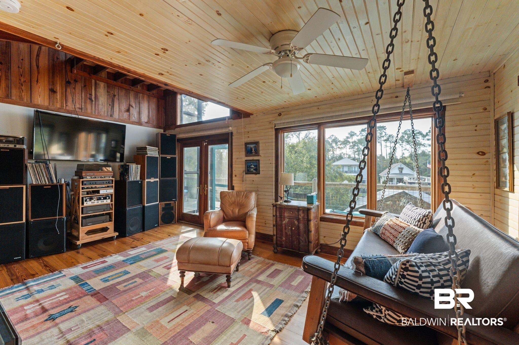 16451 Honey Road Summerdale, AL 36580 - Photo 33 of 55 Living room featuring wooden walls, hardwood / wood-style floors, wood ceiling, and french doors