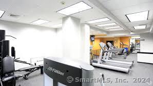 75 Prospect Street Stamford, CT 06901 - Photo 4 of 15 a living room with furniture and a flat screen tv