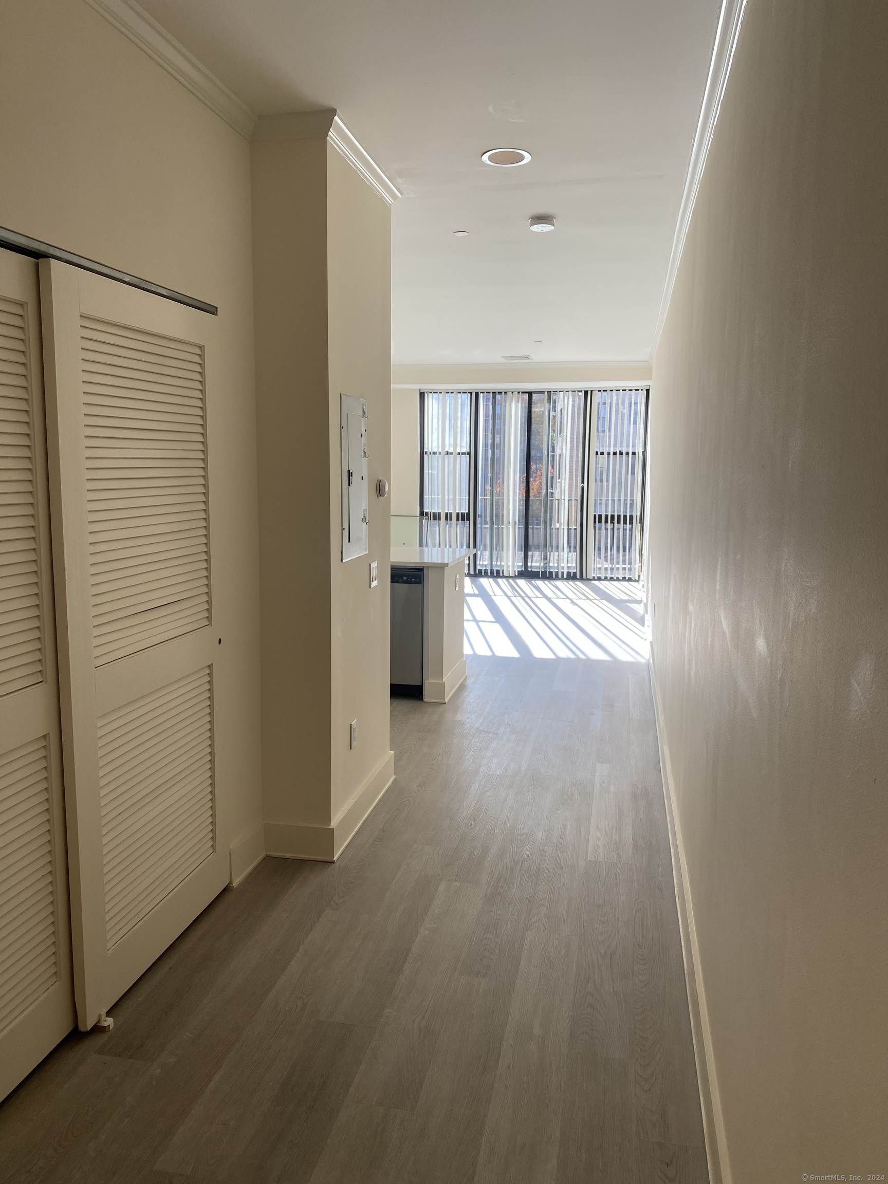 75 Prospect Street Stamford, CT 06901 - Photo 5 of 15 wooden floor in an empty room with a window